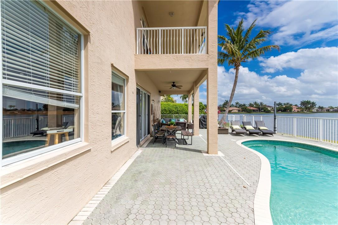 4185 Southwest 186th Way Miramar, FL 33029 - Photo 48 of 92 a view of a house with backyard porch and sitting area
