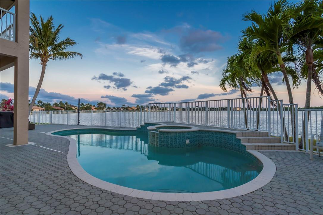4185 Southwest 186th Way Miramar, FL 33029 - Photo 57 of 92 a view of a swimming pool with a lake view
