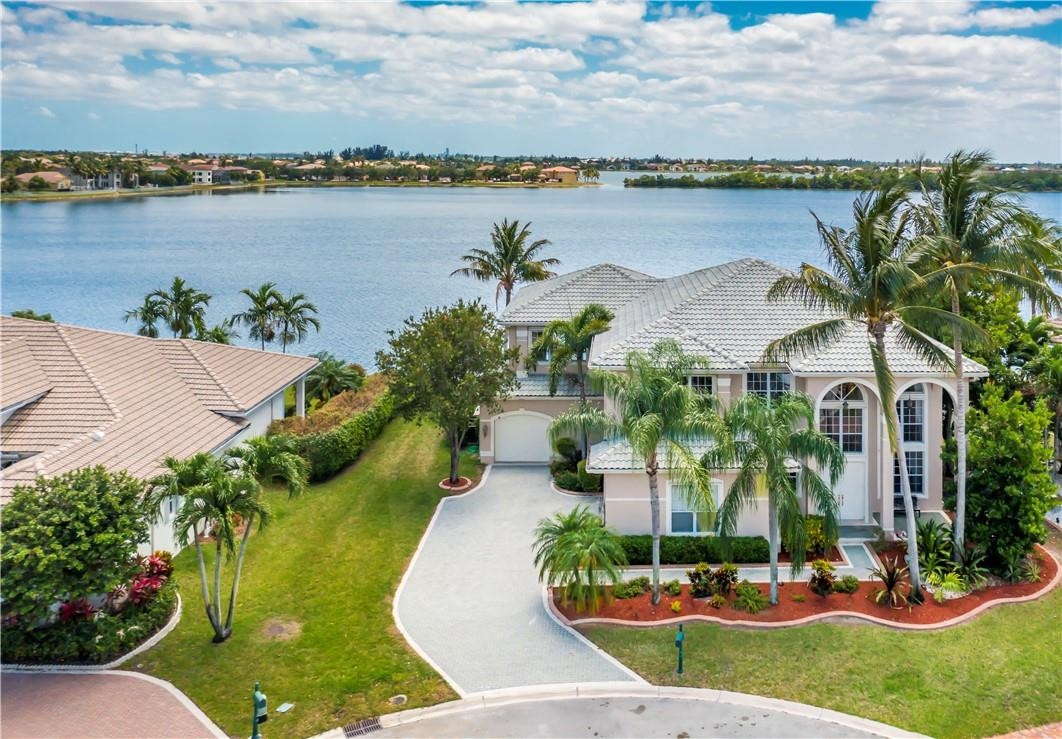 4185 Southwest 186th Way Miramar, FL 33029 - Photo 64 of 92 a view of a lake with a building in the background