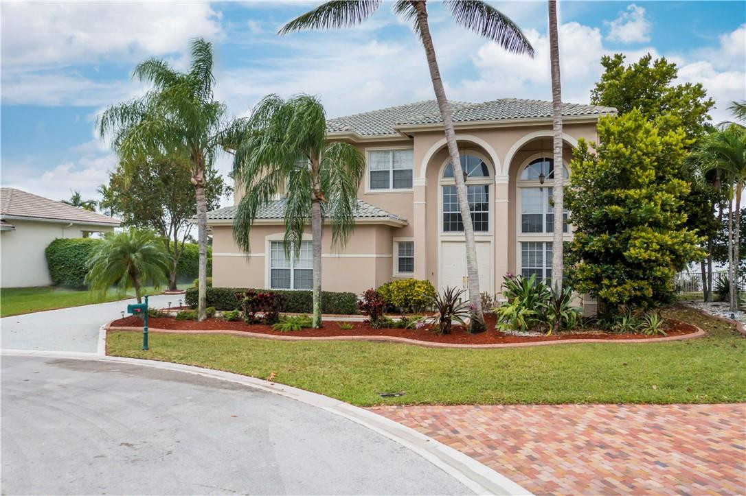 4185 Southwest 186th Way Miramar, FL 33029 - Photo 66 of 92 a front view of a house with a yard