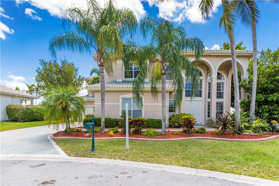 4185 Southwest 186th Way Miramar, FL 33029 - Photo 71 of 92 a view of a house with a yard and palm trees