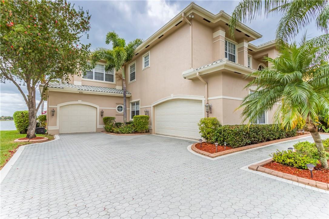 4185 Southwest 186th Way Miramar, FL 33029 - Photo 72 of 92 a front view of a house with a yard and garage