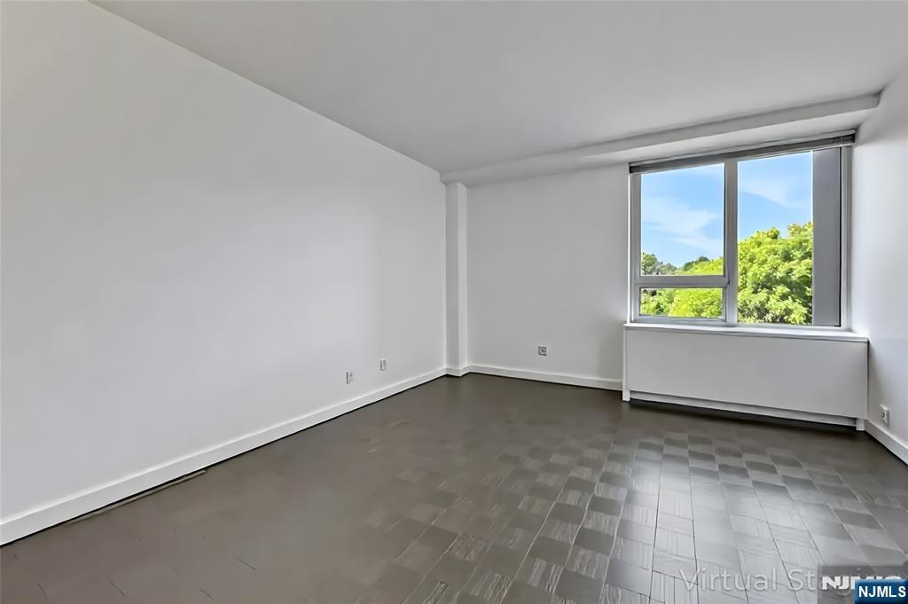 1 Horizon Road, Unit 609 Fort Lee, NJ 07024 - Photo 28 of 40 an empty room with window