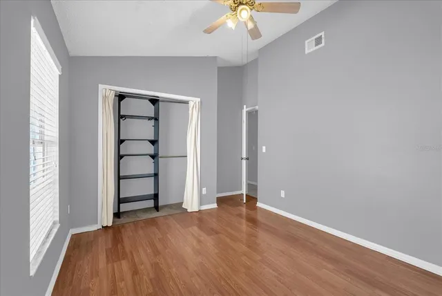 a view of an outdoor dining space with a table and chairs