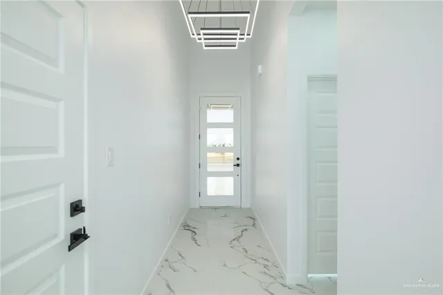 a view of hallway with stairs