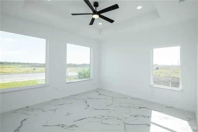 a view of an empty room and window