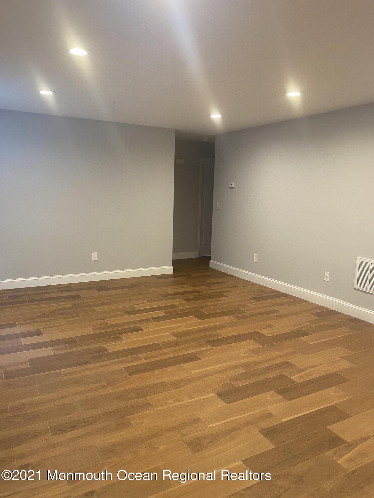 506 Harding Road, Unit 3 Freehold, NJ 07728 - Photo 2 of 18 a view of room with an empty space