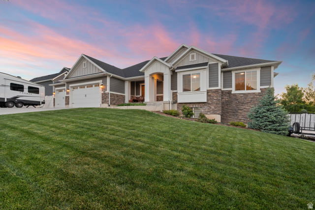 1145 North Christley Lane, Unit 48 Elk Ridge, UT 84651 - Photo 28 of 38 Split-level residence featuring a stone and siding facade