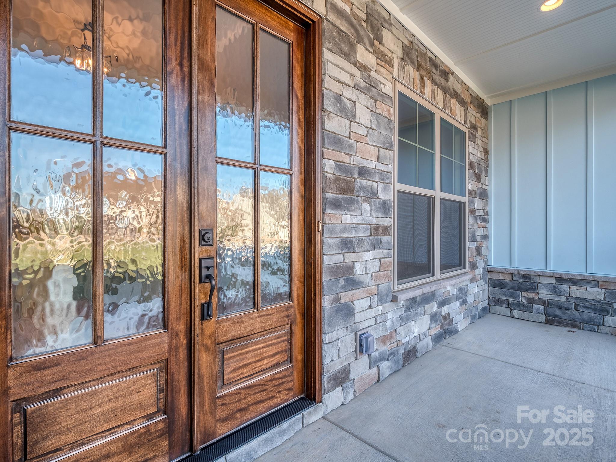 11055 Holiday Cove Lane Tega Cay, SC 29708 - Photo 2 of 39 a view of front door of house with stairs