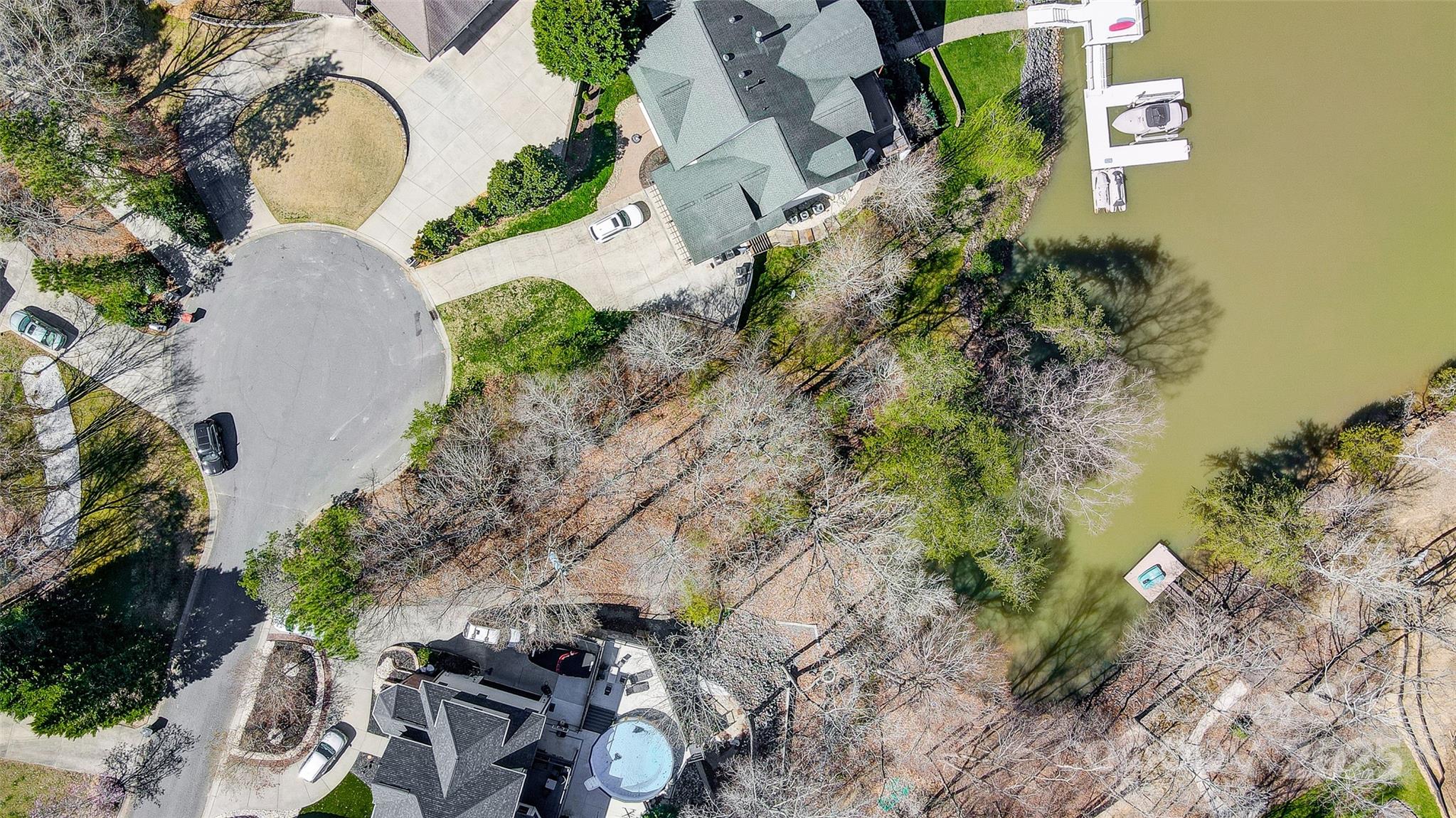 11055 Holiday Cove Lane Tega Cay, SC 29708 - Photo 29 of 39 an aerial view of residential house with outdoor space and swimming pool