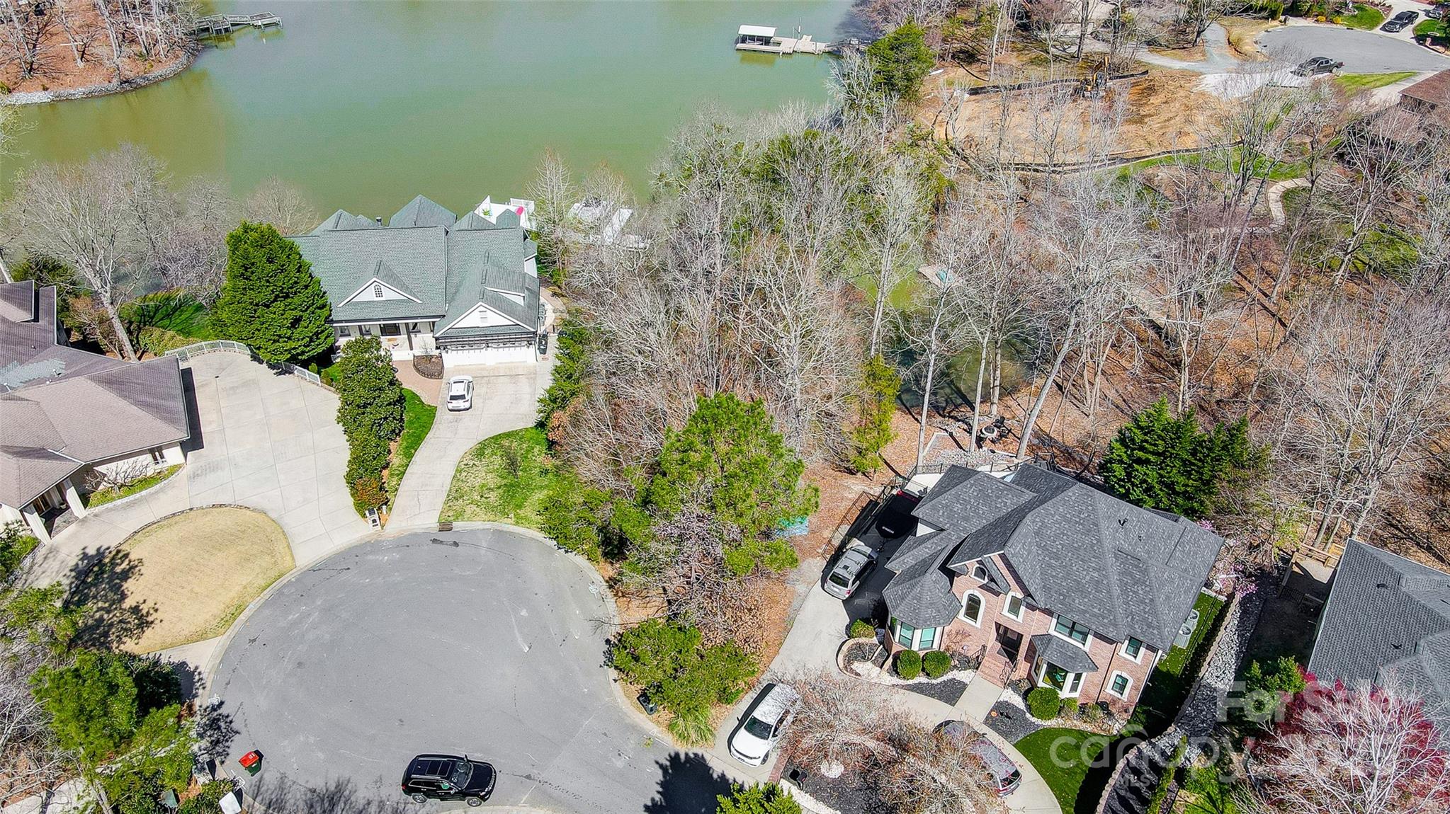 11055 Holiday Cove Lane Tega Cay, SC 29708 - Photo 32 of 39 an aerial view of a house with swimming pool and outdoor seating
