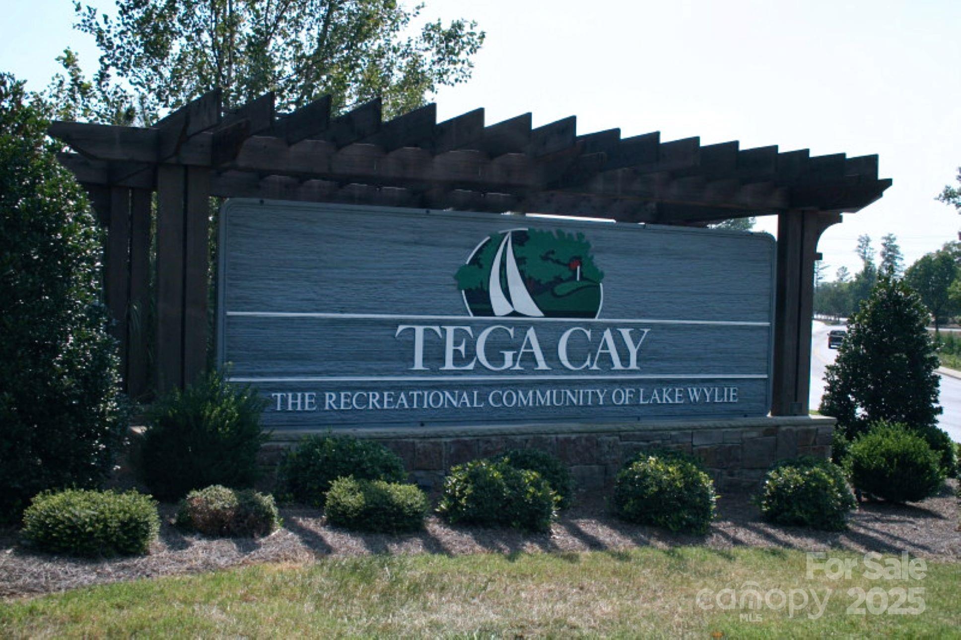 11055 Holiday Cove Lane Tega Cay, SC 29708 - Photo 35 of 39 a view of a street sign under an umbrella