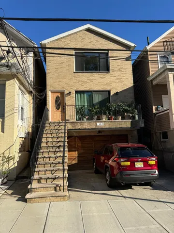 a view of a car park in front of a building