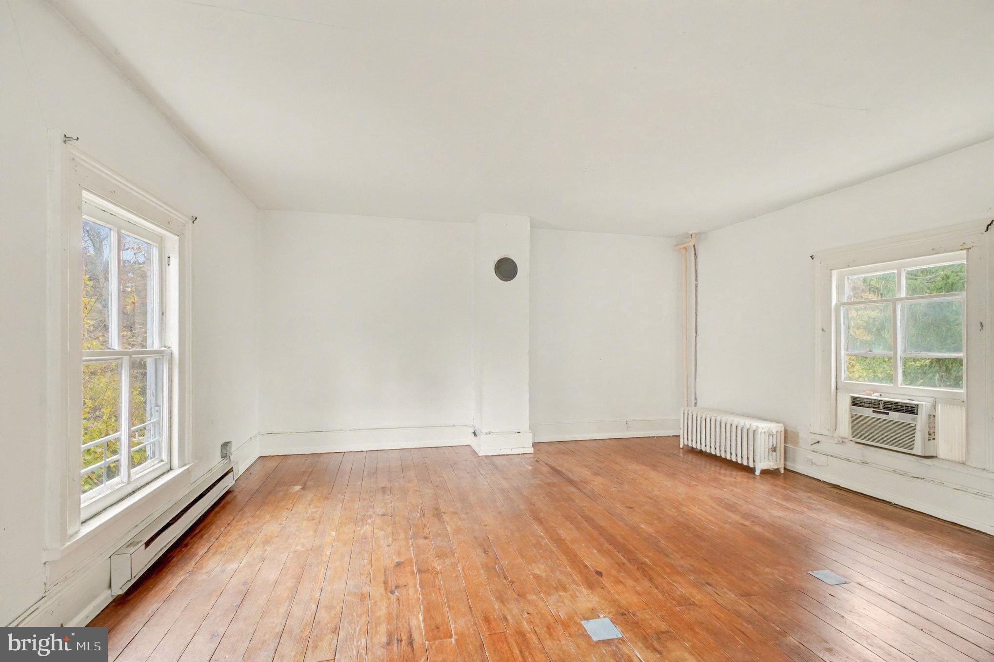 900 Ficklen Road Fredericksburg, VA 22405 - Photo 21 of 46 a view of empty room with wooden floor and fan