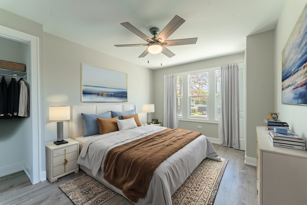 2330 121st Street Blue Island, IL 60406 - Photo 9 of 33 a bedroom with a large bed and a window
