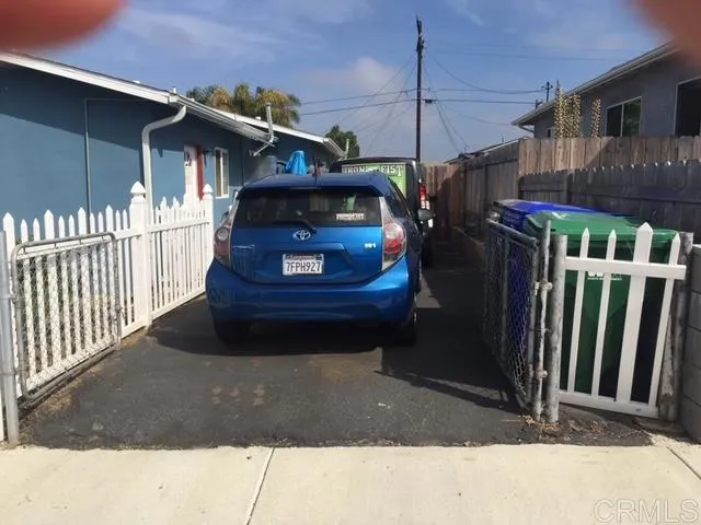 1402 Dubuque Street Oceanside, CA 92058 - Photo 19 of 21 a view of a car park in front of house