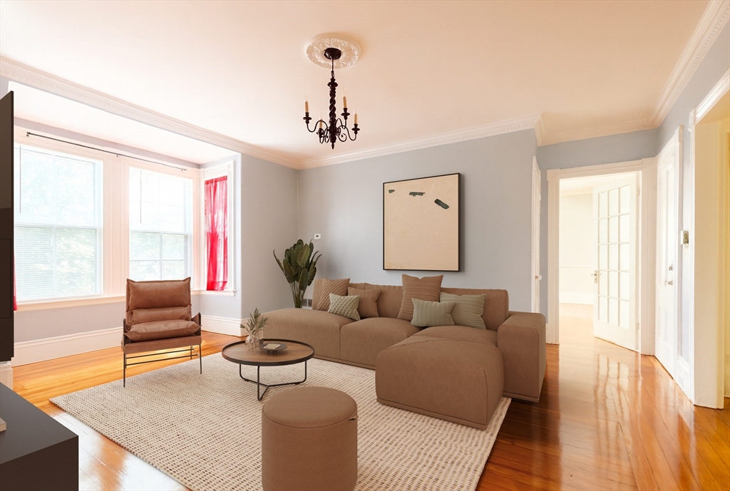 327 Lafayette Street, Unit 2 Salem, MA 01970 - Photo 2 of 22 a living room with furniture and a large window