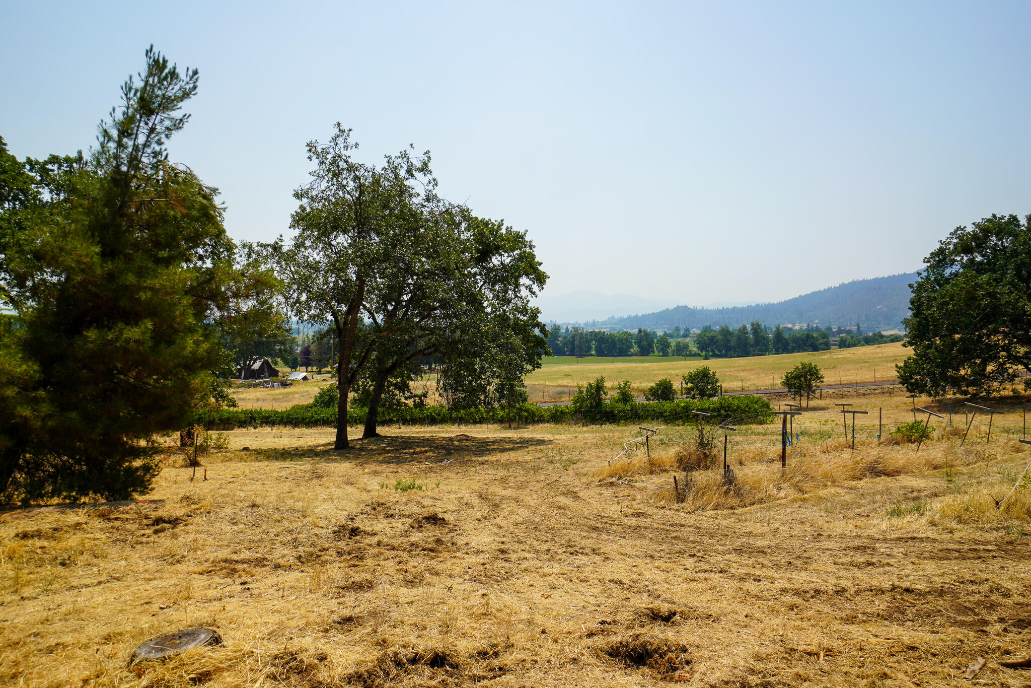 3632 Willow Springs Road Central Point, OR 97502 - Photo 28 of 36 a view of a lake with a yard