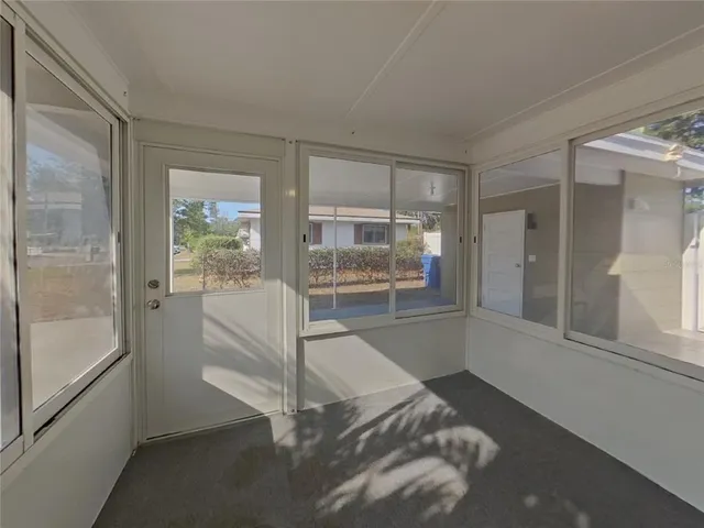 a white bath tub sitting in a en suite bathroom