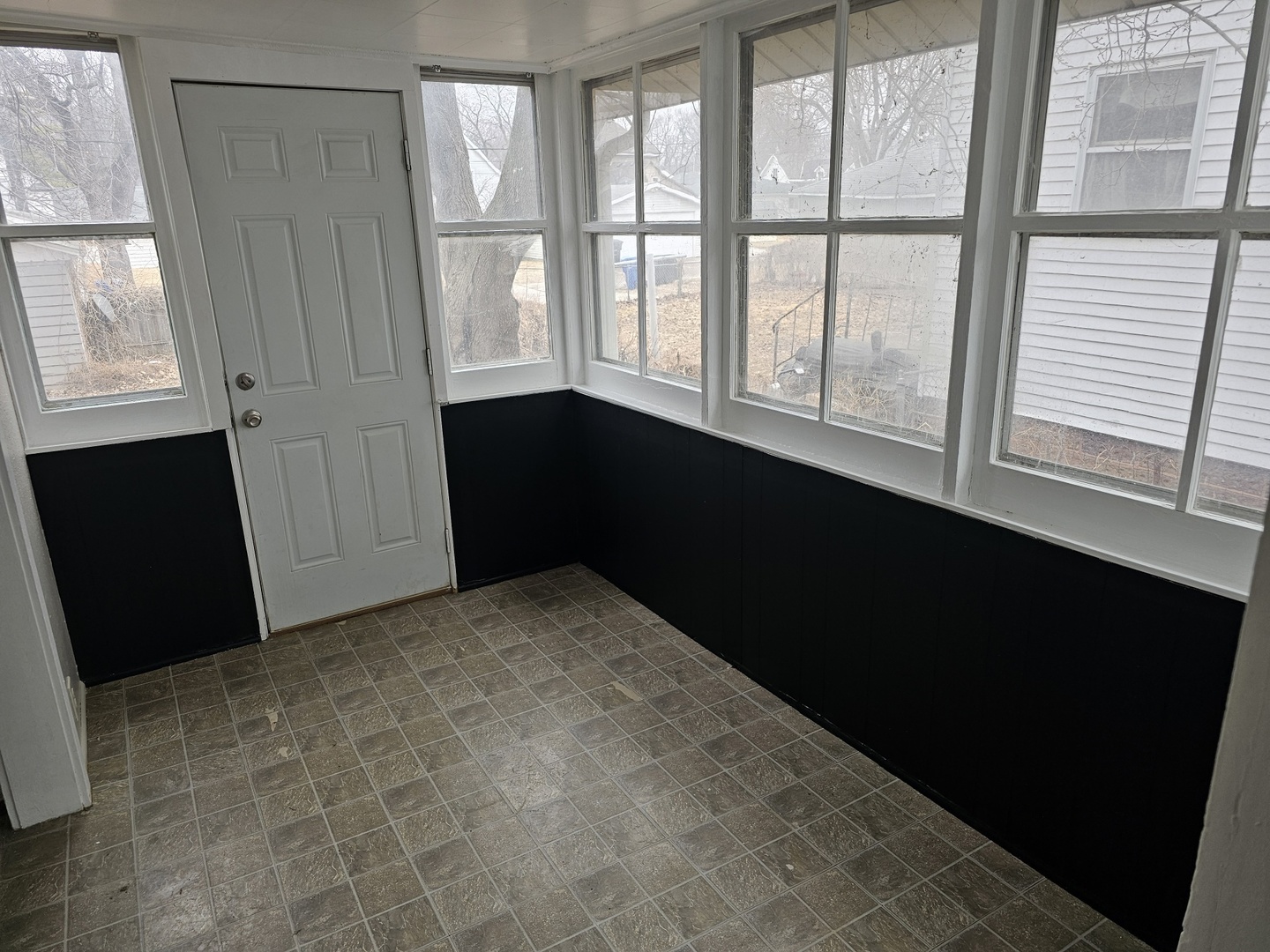 1114 25th Street Moline, IL 61265 - Photo 11 of 18 a view of an empty room with a window