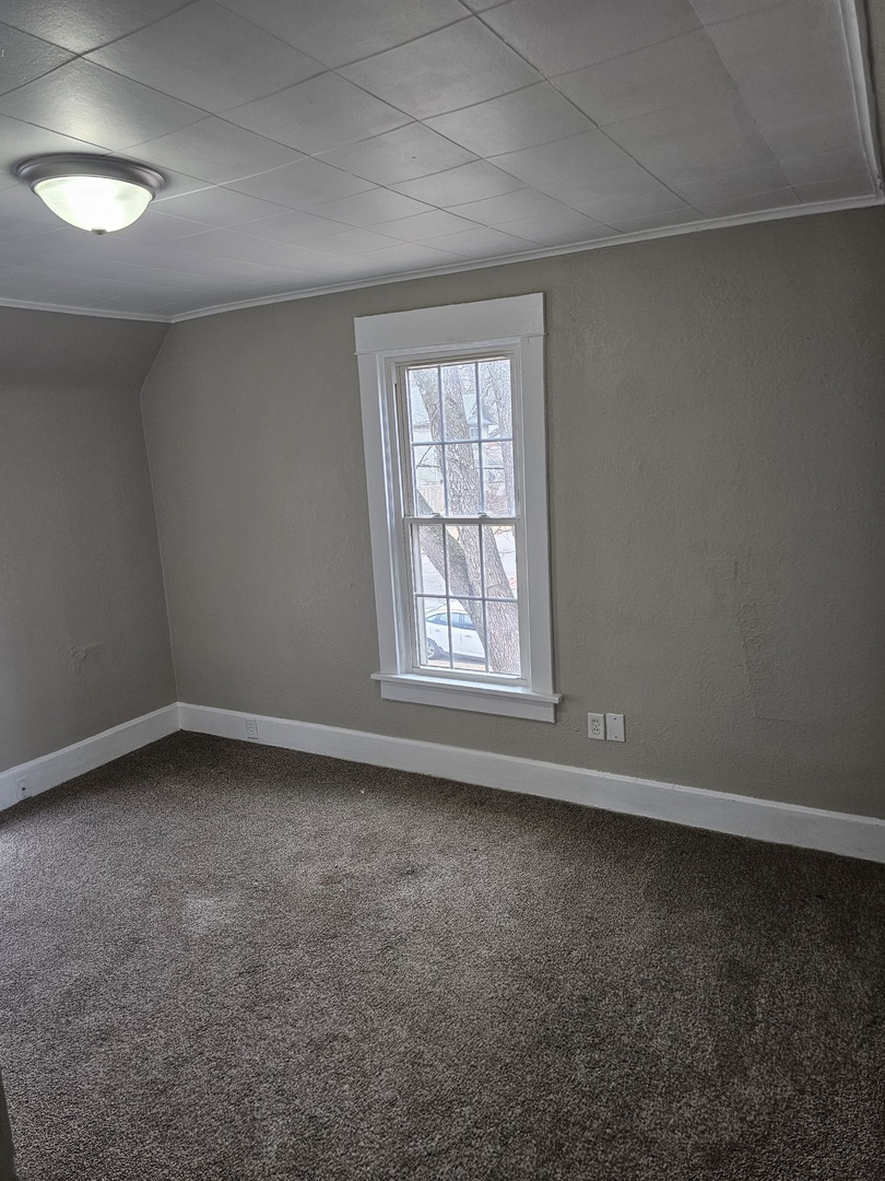 1114 25th Street Moline, IL 61265 - Photo 14 of 18 an empty room with a window
