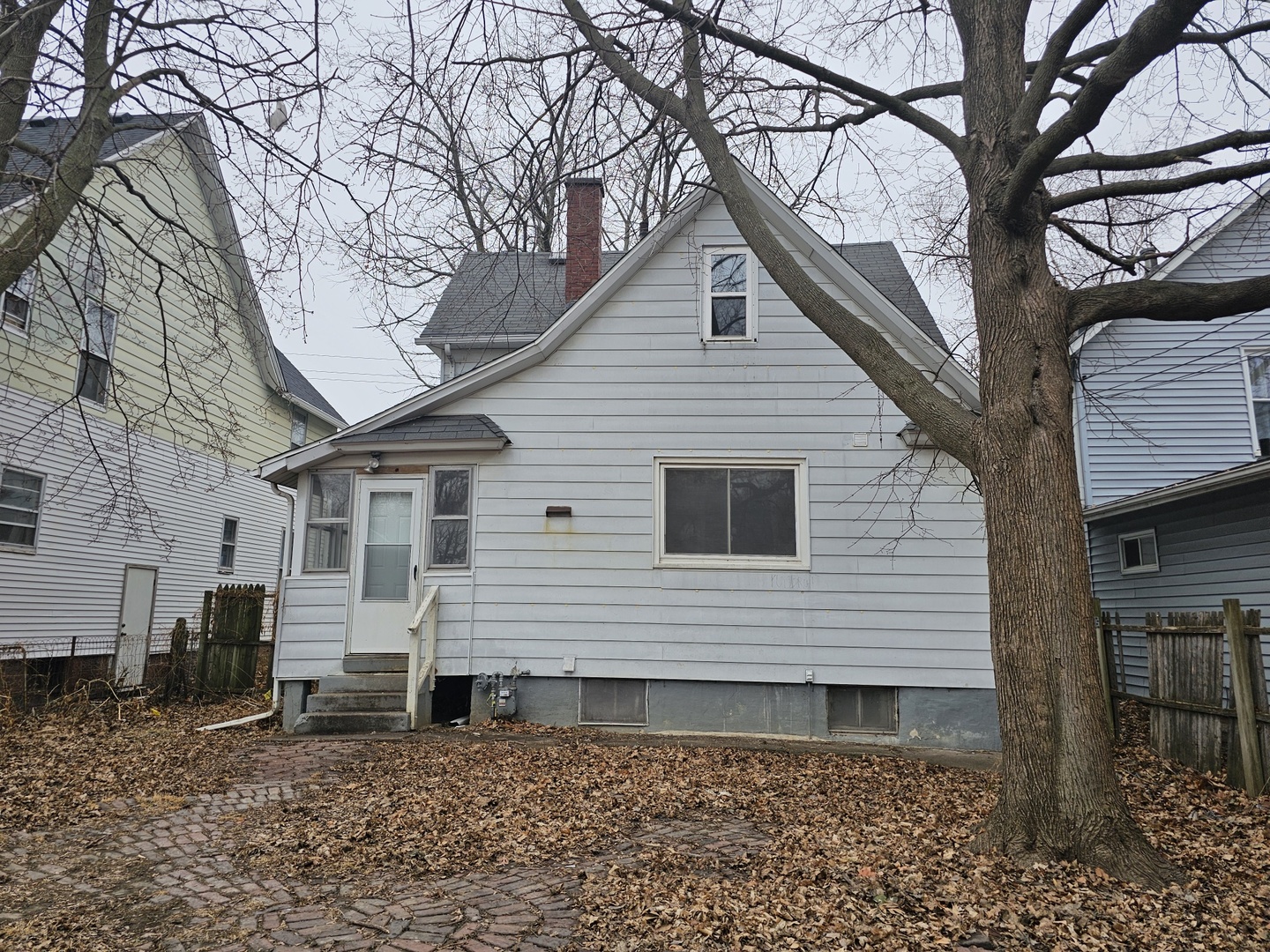 1114 25th Street Moline, IL 61265 - Photo 2 of 18 a view of a house with a yard