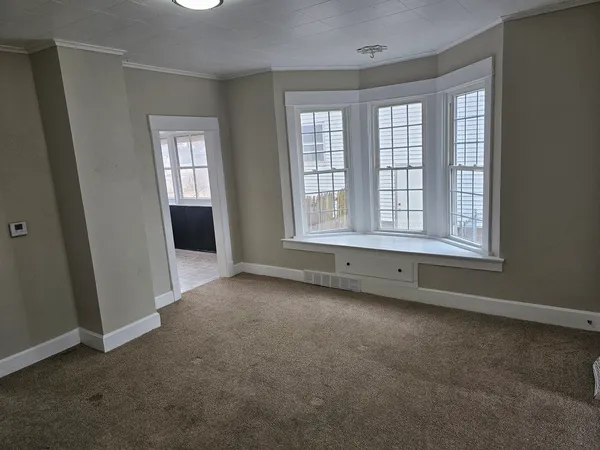 an empty room with windows