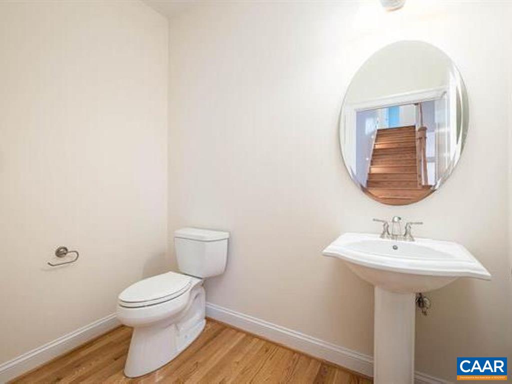 6 Ridgeview Drive Ruckersville, VA 22968 - Photo 11 of 32 a bathroom with a sink toilet and mirror