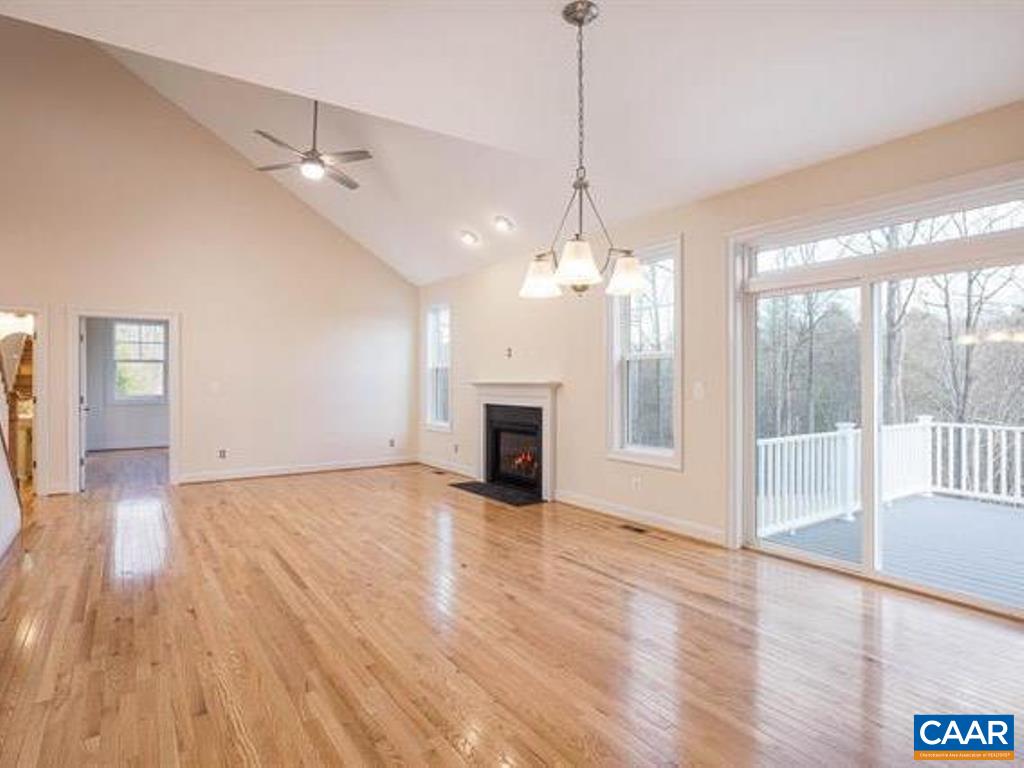 6 Ridgeview Drive Ruckersville, VA 22968 - Photo 16 of 32 a view of a room with wooden floor fireplace and windows