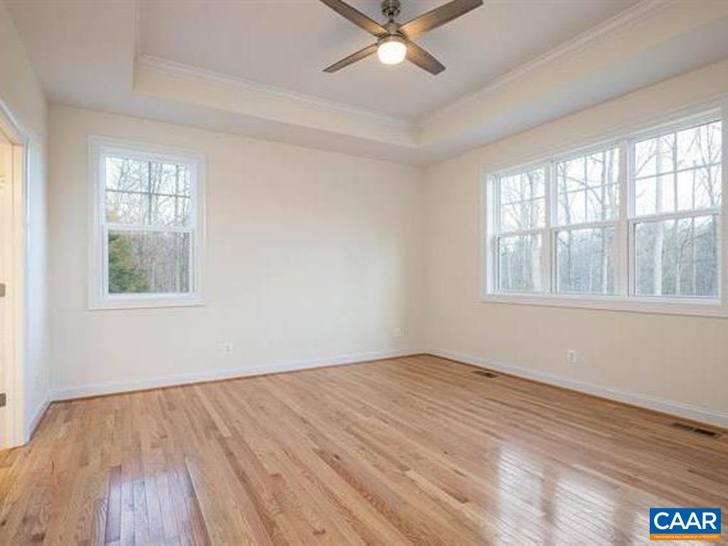 6 Ridgeview Drive Ruckersville, VA 22968 - Photo 24 of 32 wooden floor in an empty room with a window