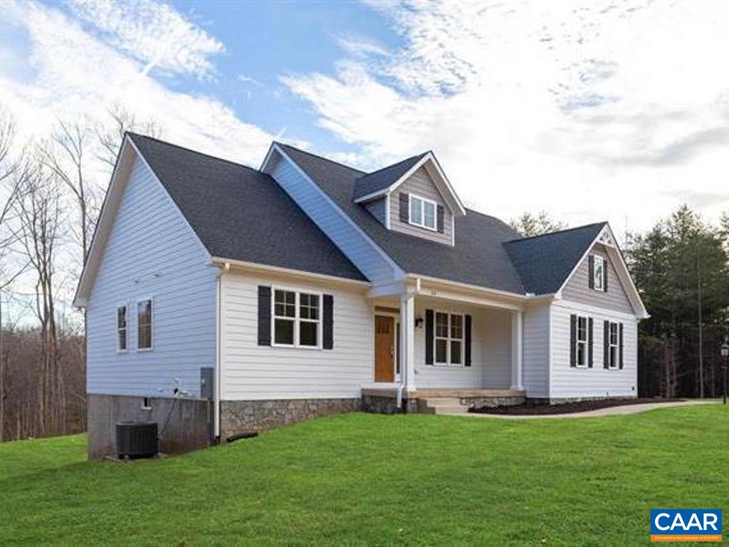 6 Ridgeview Drive Ruckersville, VA 22968 - Photo 5 of 32 a front view of a house with a garden