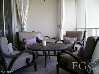 2090 West First Street, Unit 2007 Fort Myers, FL 33901 - Photo 7 of 10 a view of a workspace with furniture and a window