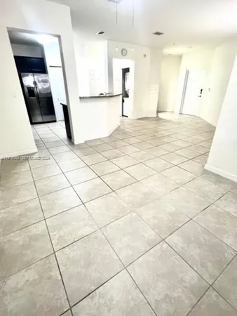 a view of a kitchen with a sink