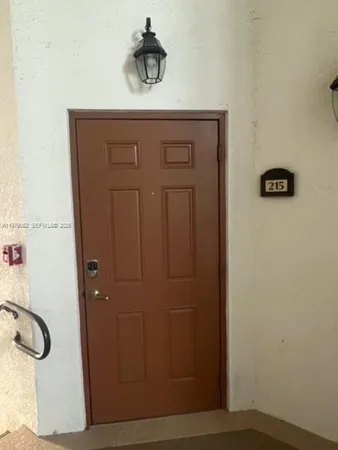 a bathroom with a granite countertop sink and vanity