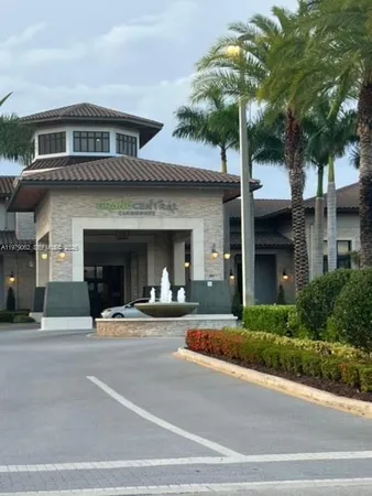 a view of a building with a street