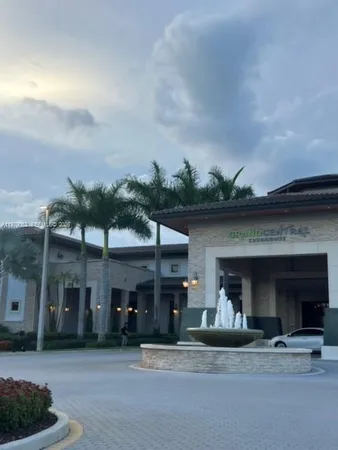 a view of a building with a garden