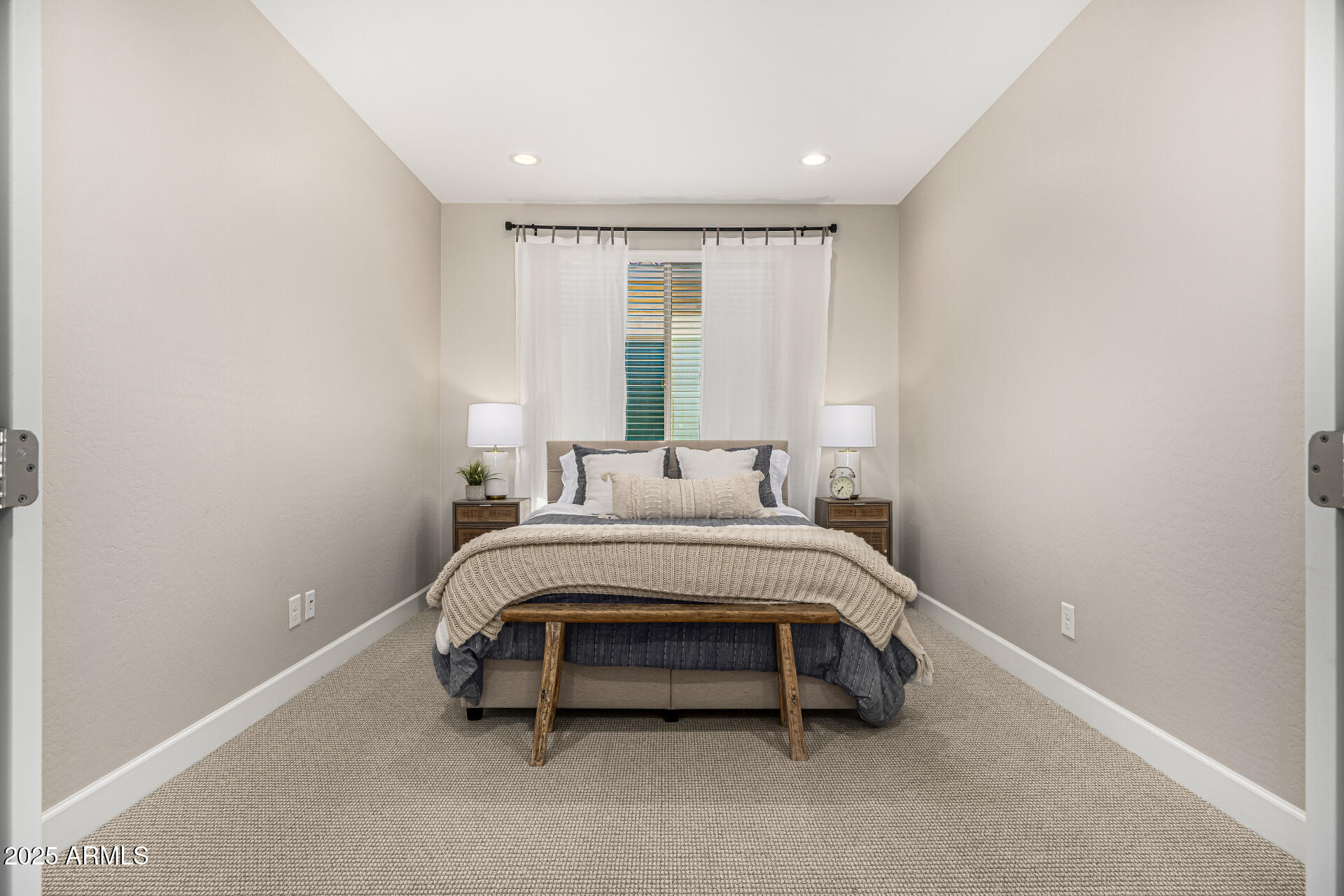 16897 West Merrell Street Goodyear, AZ 85395 - Photo 15 of 21 a bed room with a bed and a window