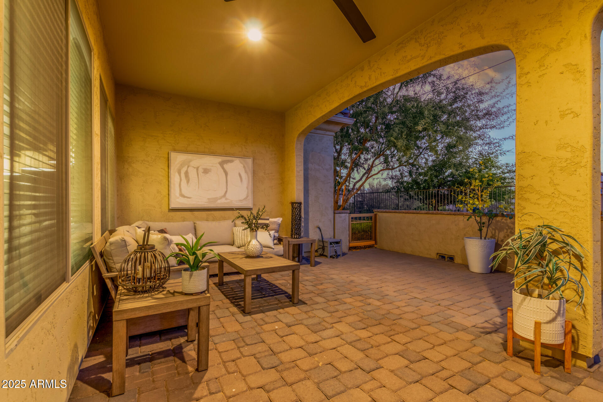 16897 West Merrell Street Goodyear, AZ 85395 - Photo 19 of 21 a building outdoor space with patio furniture and potted plants