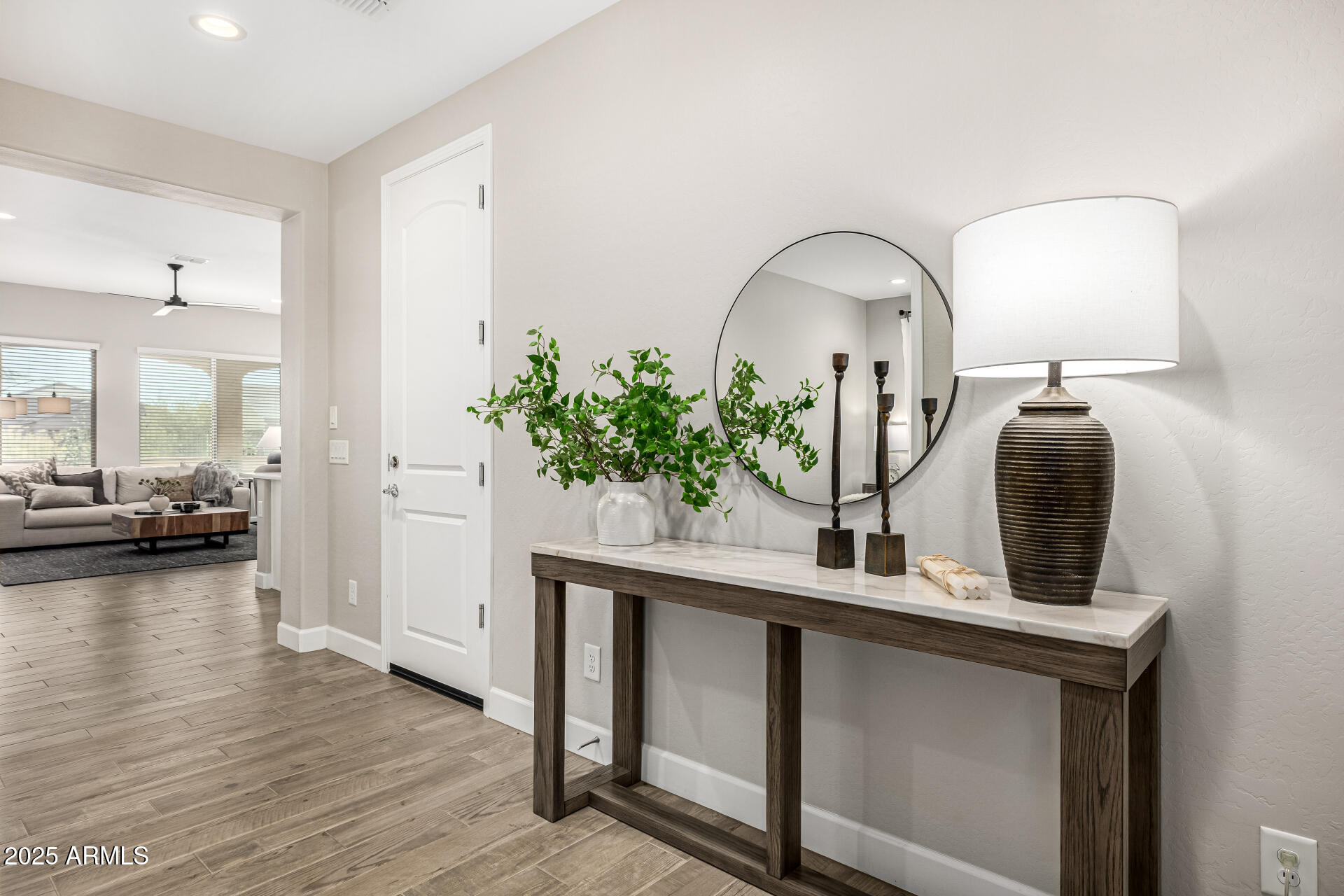16897 West Merrell Street Goodyear, AZ 85395 - Photo 3 of 21 a view of living room and entryway