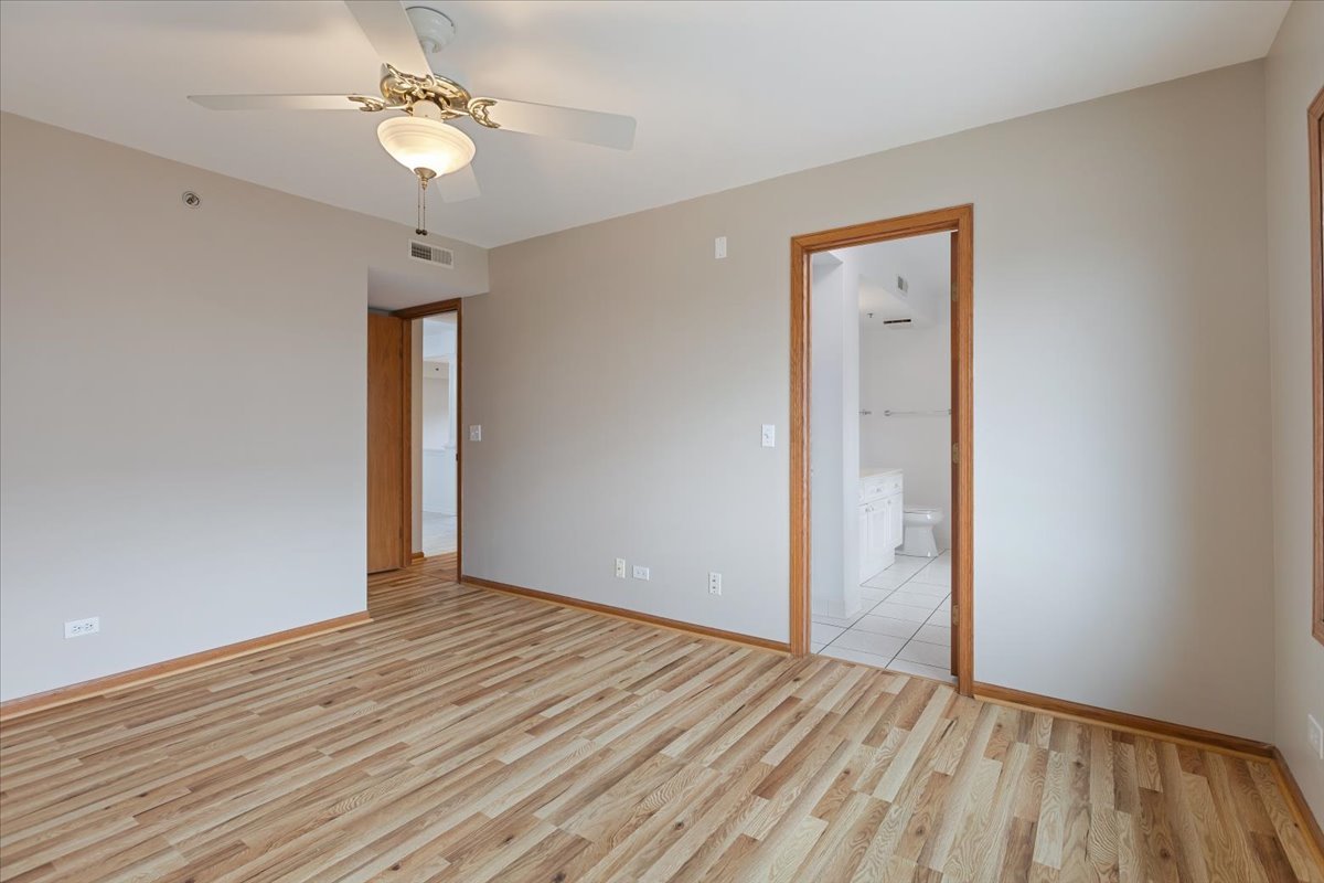 5 South Pine Street, Unit 509 Mount Prospect, IL 60056 - Photo 16 of 31 a view of empty room with wooden floor