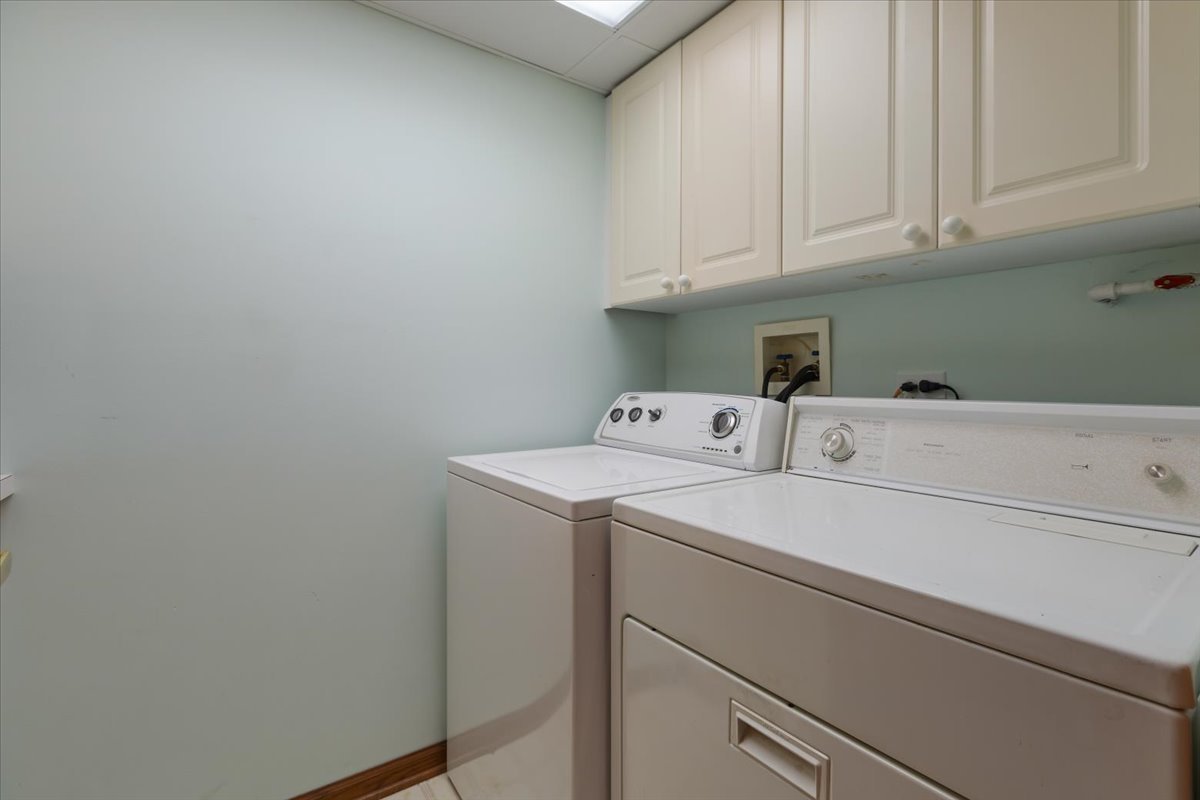 5 South Pine Street, Unit 509 Mount Prospect, IL 60056 - Photo 25 of 31 a utility room with dryer and washer