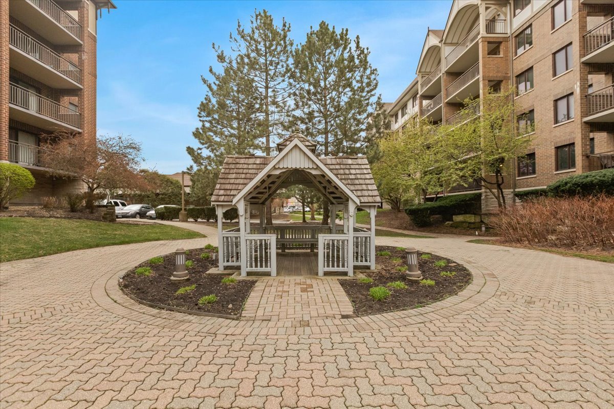 5 South Pine Street, Unit 509 Mount Prospect, IL 60056 - Photo 27 of 31 a view of a building with a yard