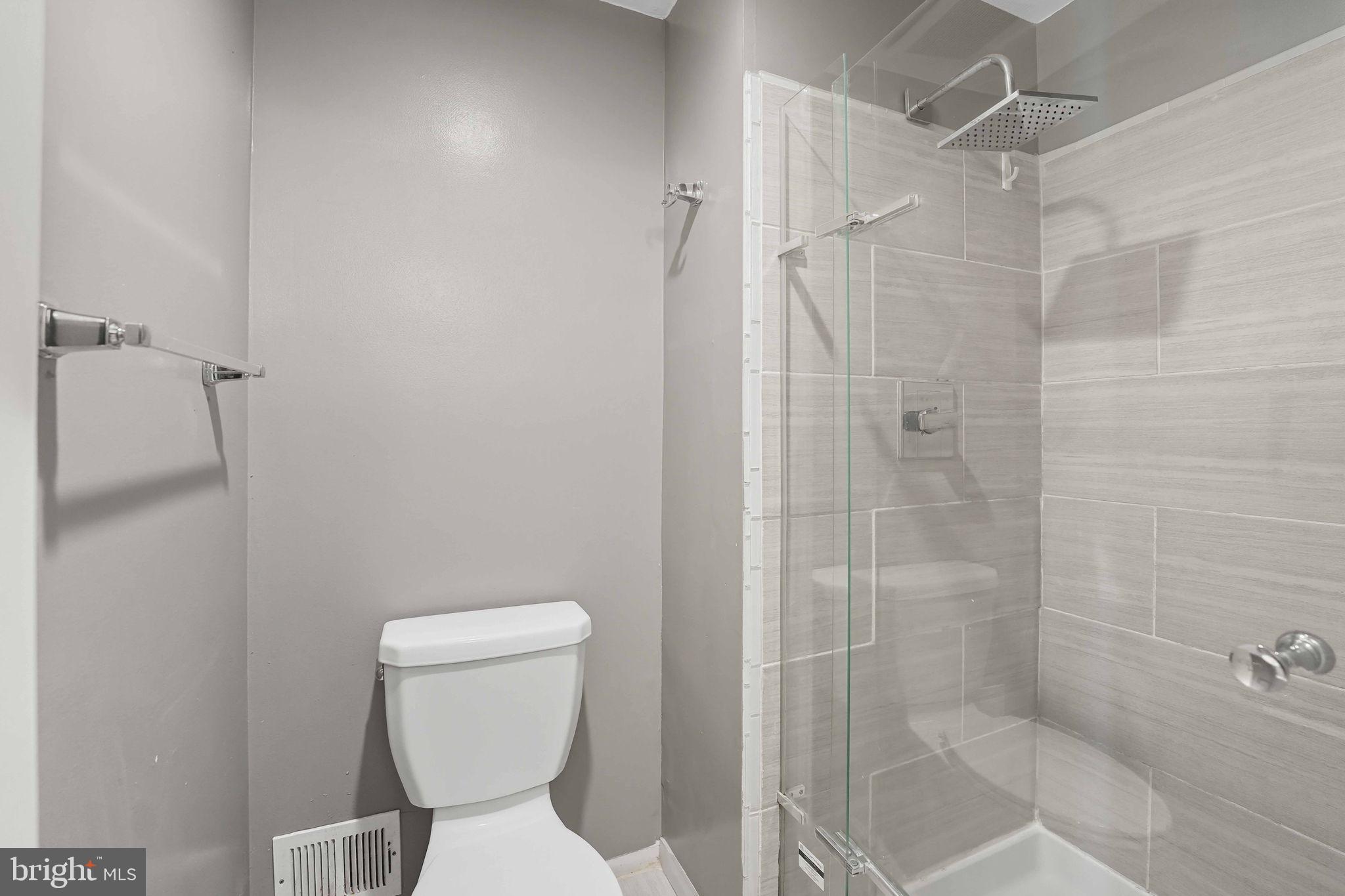 258 North Cottage Road Sterling, VA 20164 - Photo 19 of 33 a bathroom with a toilet and a shower