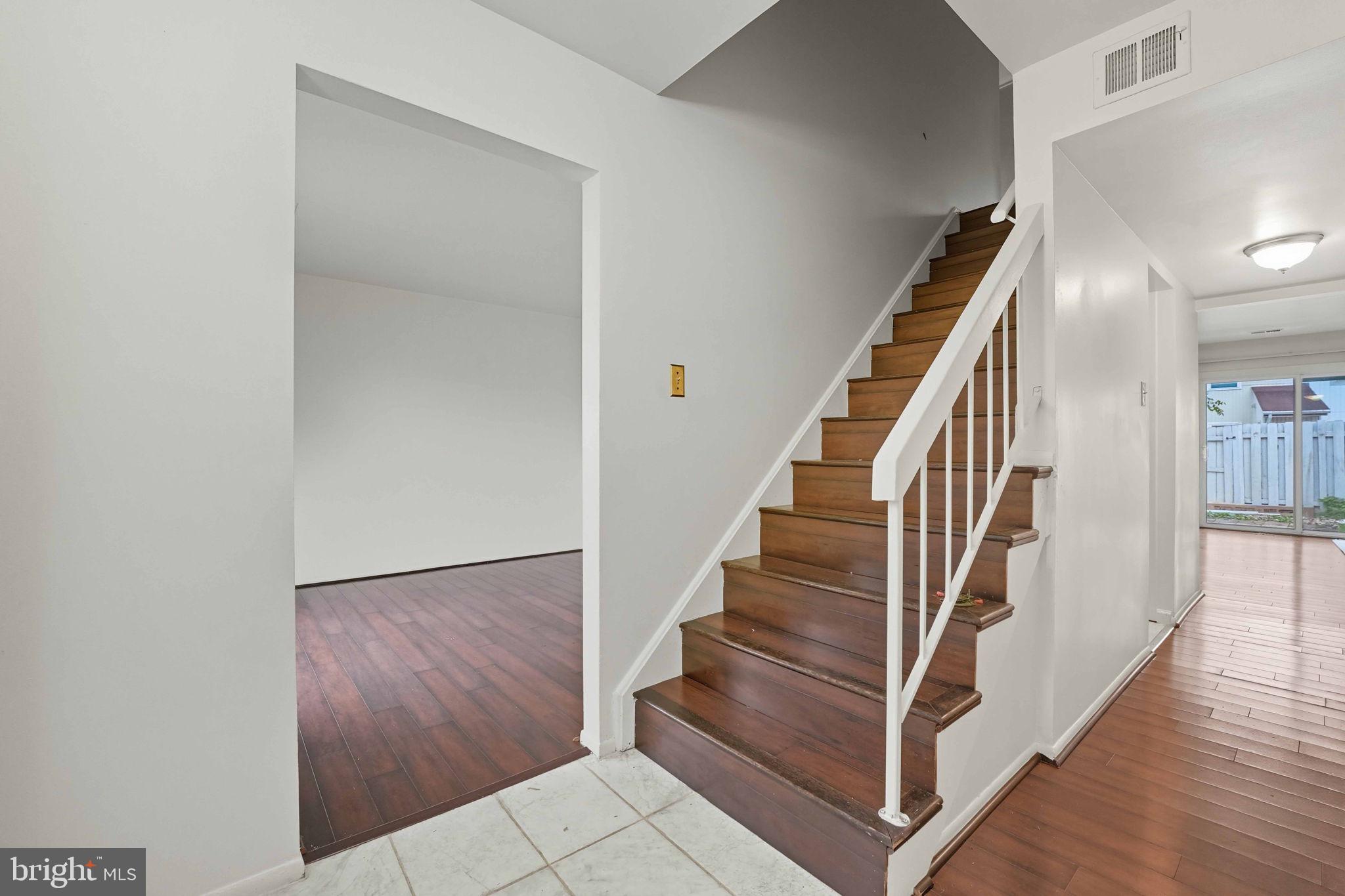 258 North Cottage Road Sterling, VA 20164 - Photo 2 of 33 a view of entryway and hall with wooden floor