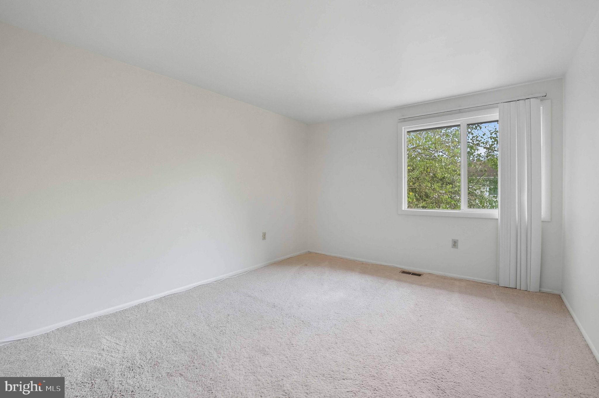 258 North Cottage Road Sterling, VA 20164 - Photo 22 of 33 an empty room with a window
