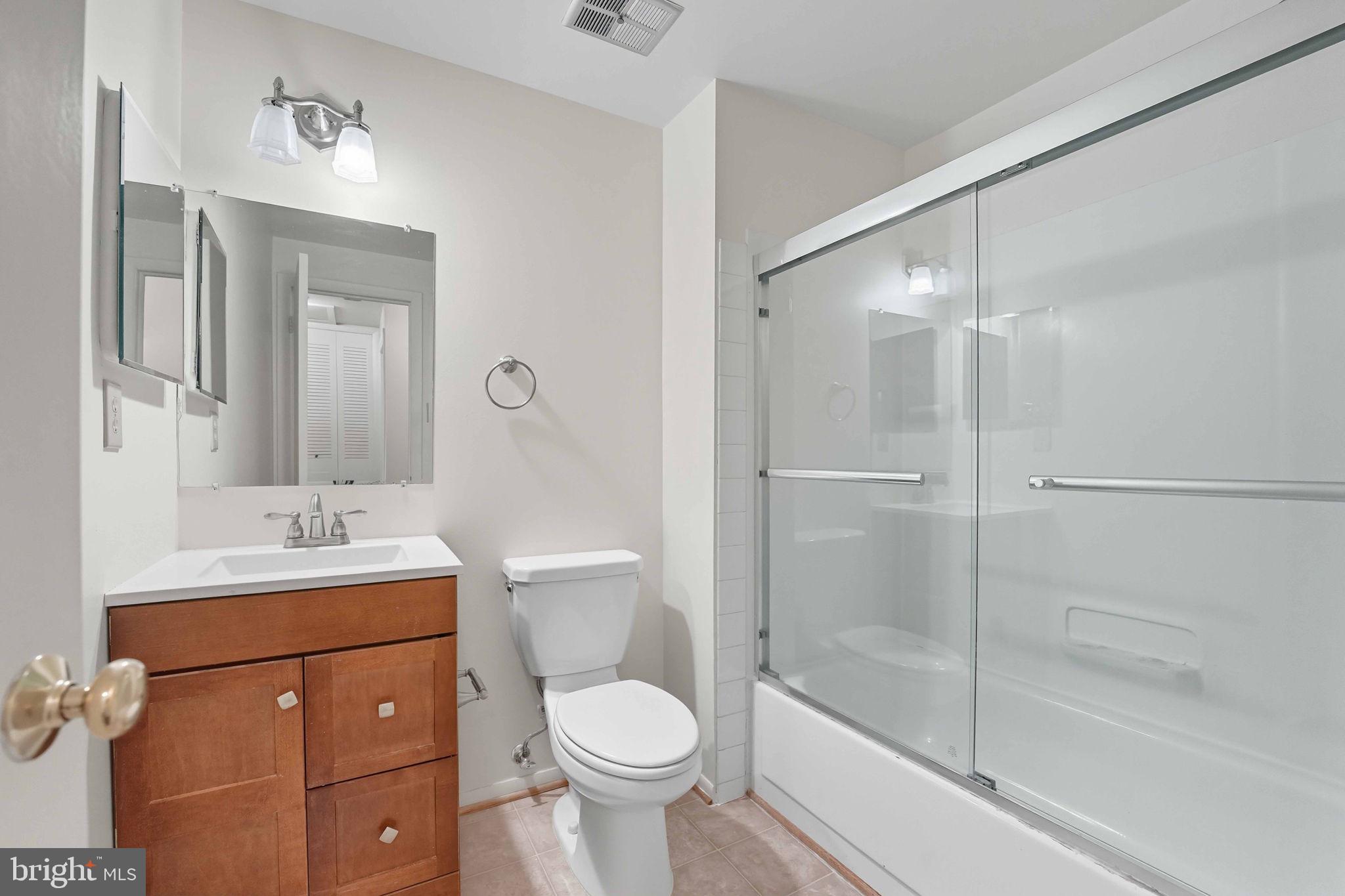 258 North Cottage Road Sterling, VA 20164 - Photo 25 of 33 a bathroom with a sink toilet and shower