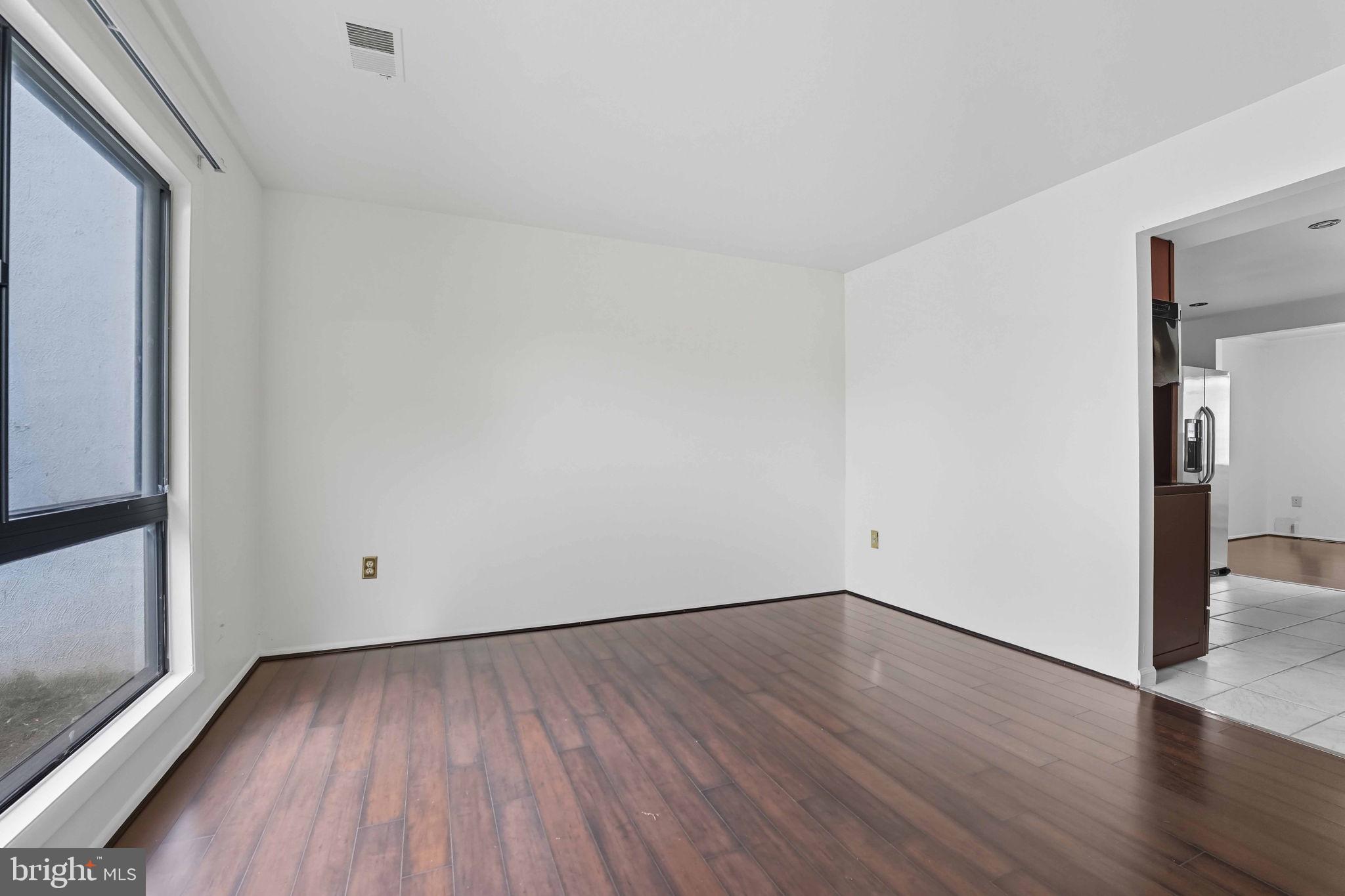 258 North Cottage Road Sterling, VA 20164 - Photo 5 of 33 a view of a room with wooden floor