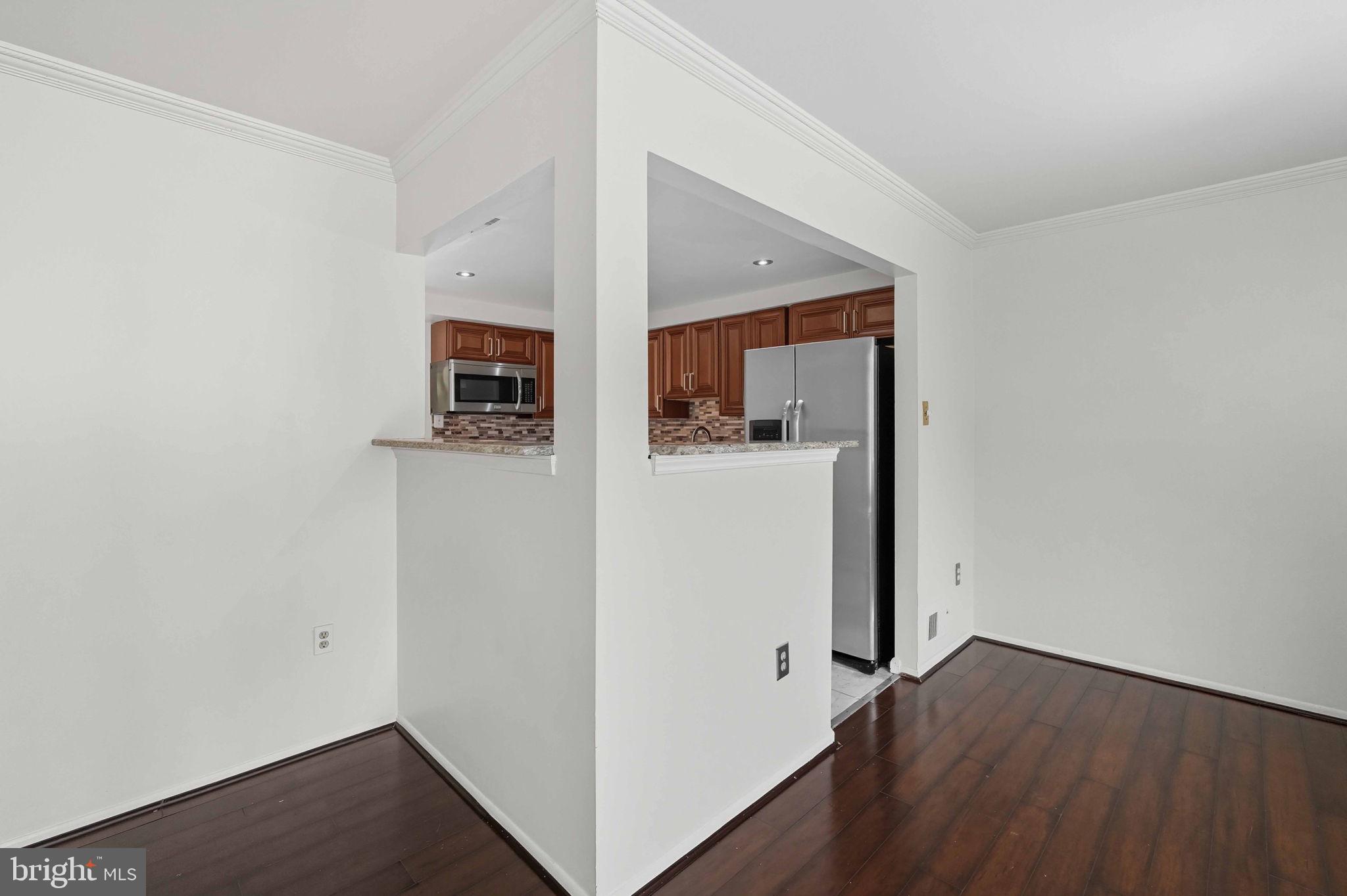 258 North Cottage Road Sterling, VA 20164 - Photo 8 of 33 a view of a hallway with wooden floor and closet