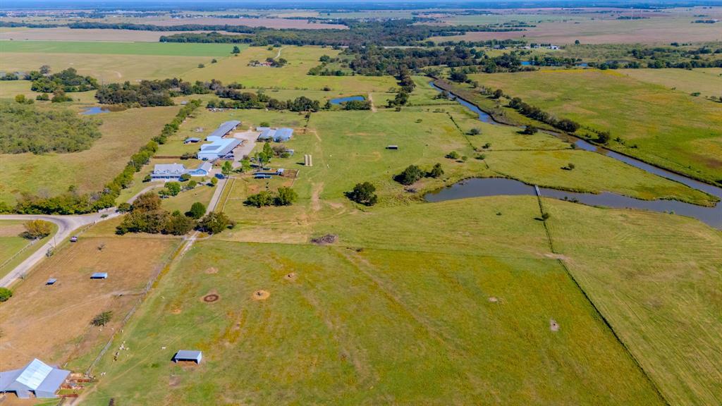 45-acres Strittmatter Road Pilot Point, TX 76258 - Photo 15 of 20 an aerial view of a residential building with outdoor space