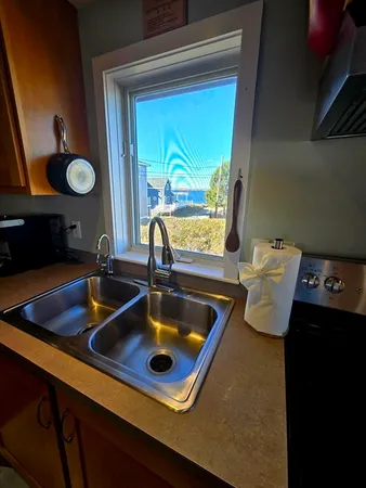 a room with furniture and window